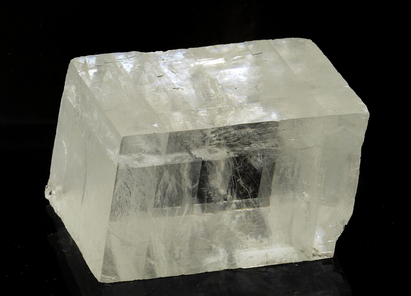 Calcit (Spaltstück)| B: 4.5 cm, F: Kristallhöhle Kobelwald, SG 